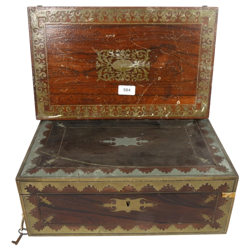 584 - A Regency rosewood and brass-bound travelling writing slope, with associated inkwells, and a coraman... 