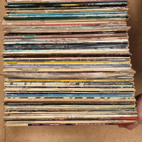 596 - A quantity of vinyl LPs, 60s/70s rock in genre, including such artists as Tom Petty and The Heartbre... 