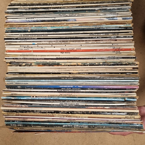 607 - A quantity of vinyl records, various genres, including such artists as Johnnie Cash, Jimi Hendrix, S... 