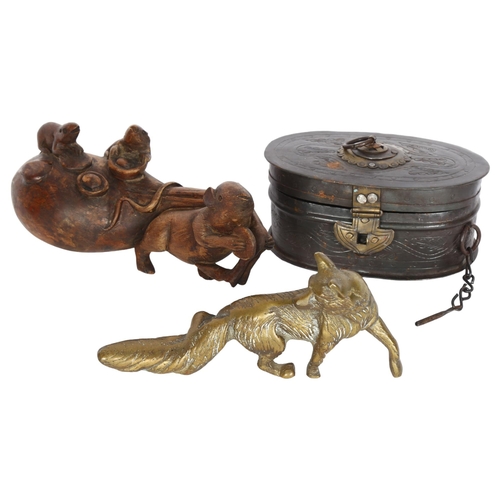 808 - An Oriental engraved metal box with brass mounts, L17cm, a carved wood rat group, and a brass fox