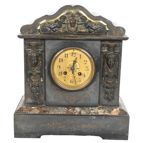 810 - A slate and marble-cased mantel clock, with mask decoration, H34cm