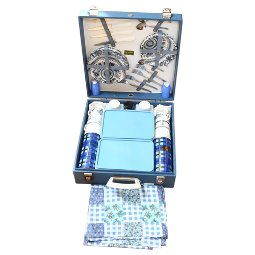 819 - A Vintage Brexton blue-cased picnic set with original fittings