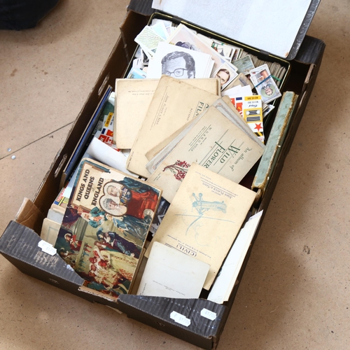 822 - A boxful of cigarette card albums, postcards, snapshots, tin etc