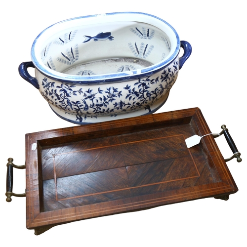 824 - Inlaid 2-handled tea tray on brass feet, and a reproduction blue and white printed footbath, L57cm o... 