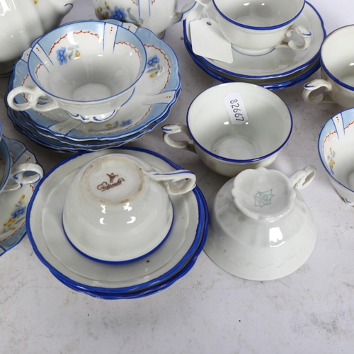 832 - 6 Eichwald blue-edged cups and saucers, and a Russian porcelain coffee service, marked STP