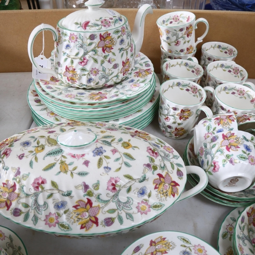 842 - Minton's Haddon Hall pattern dinner and teaware, including teapots, vegetable tureen, jugs, and a se... 