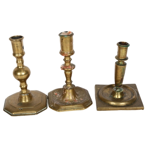 843 - A 17th/18th century Spanish bronze candlestick, together with 2 others, tallest 17cm