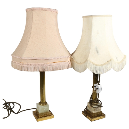 874 - A pair of Classical design gilt and onyx table lamps with shades, height overall 59cm