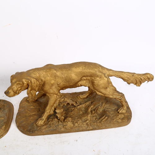 878 - A pair of gilded spelter Gundogs on naturalistic plinths, L31cm