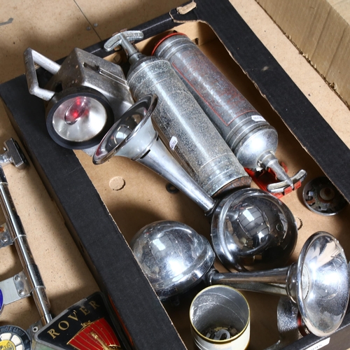 895 - A group of Vintage motoring badges, 2 fire extinguishers, a railway lamp, Lucas horns etc