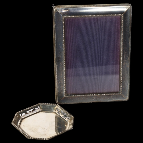 1224 - A modern silver-fronted rectangular photo frame, and a small octagonal silver dish (2)