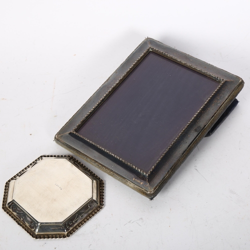 1224 - A modern silver-fronted rectangular photo frame, and a small octagonal silver dish (2)