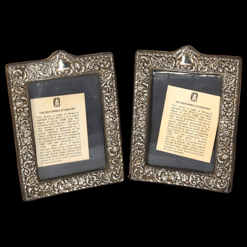 1225 - A pair of Elizabeth II embossed silver-fronted photo frames, hallmarks for London 1986