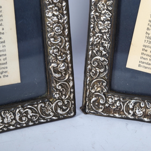 1225 - A pair of Elizabeth II embossed silver-fronted photo frames, hallmarks for London 1986