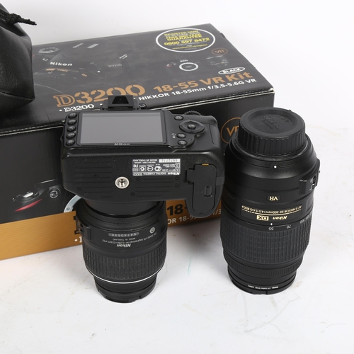 609 - NIKON - a D3200 camera and associated accessories, in original box, including a Nikon A5-SDX Nikkor ... 