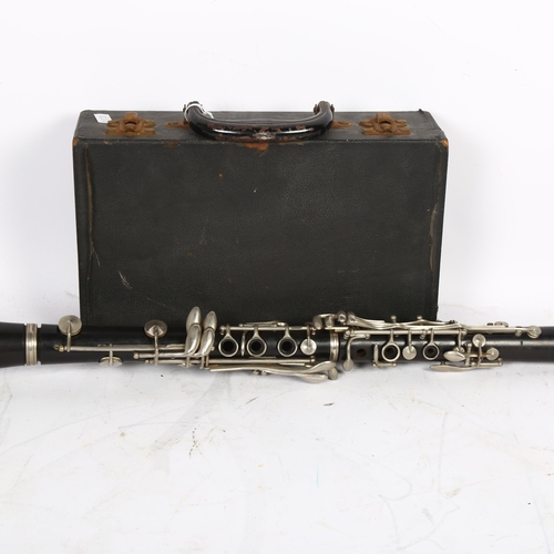 617 - Boosey and Hawkes - A clarinet with Callet mouthpiece, in hard-shell branded carry case.