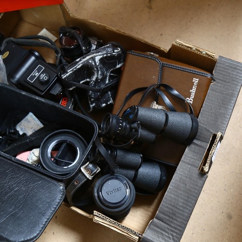 635 - A quantity of Vintage cameras, binoculars and associated equipment, including Olympus OM-2, with Viv... 