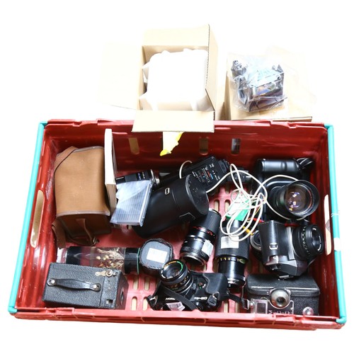 638 - A quantity of Vintage cameras and equipment including Canon T90 with Howell macro lens NO.220890, a ... 