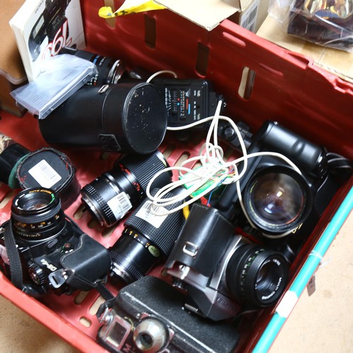 638 - A quantity of Vintage cameras and equipment including Canon T90 with Howell macro lens NO.220890, a ... 