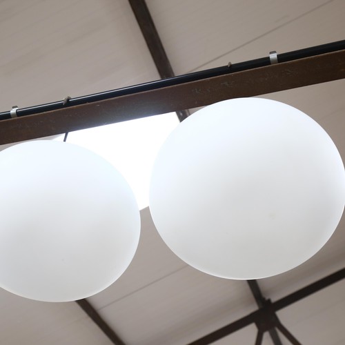 651 - A pair of contemporary Flos Glo-Ball C1 ceiling or wall lights, with large spheroidal glass diffuses... 