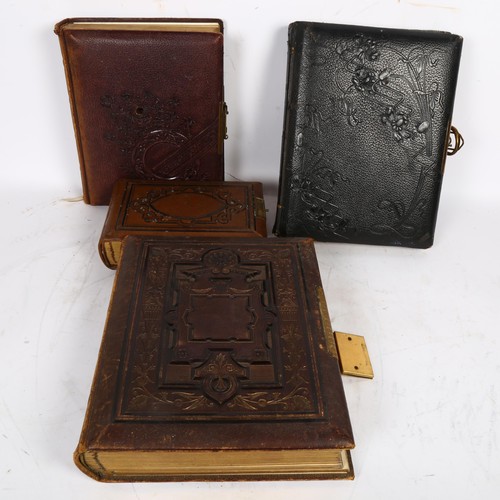 656 - 4 Victorian embossed and tooled leather photograph albums, including 1 musical (all empty)