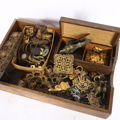 662 - A tray of Victorian and other gilt-metal furniture and other mounts