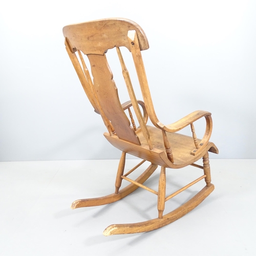 2278 - An oak and mahogany Boston rocking chair.