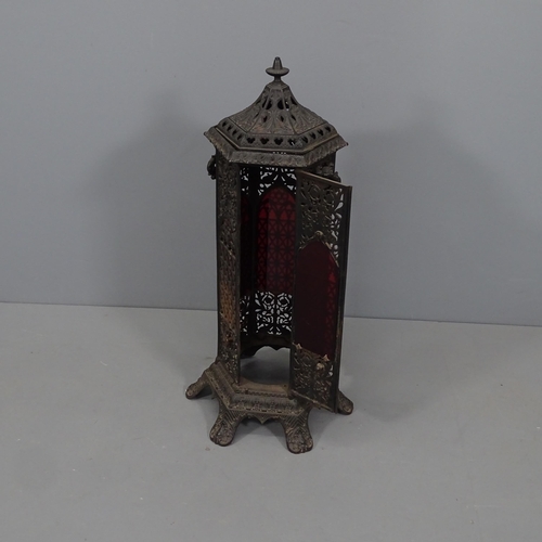 2282 - An antique octagonal cast iron station heater. Lacking fittings. Height 85cm.