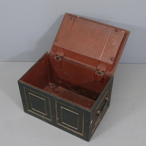 2284 - A cast iron strong box. With key. 54x33x36cm.