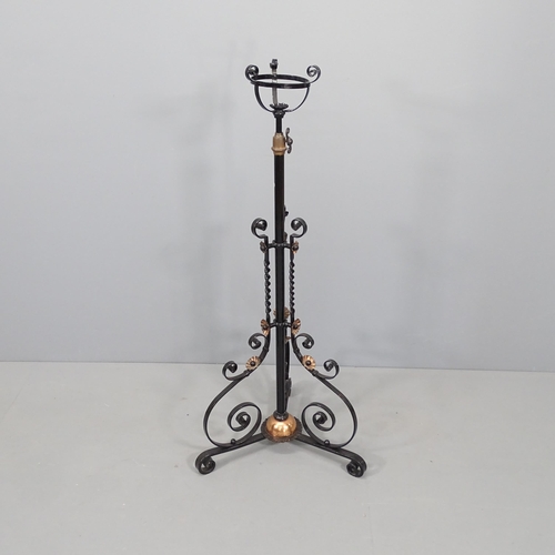 2285 - A painted wrought iron floor standing oil lamp base. Height 120cm.