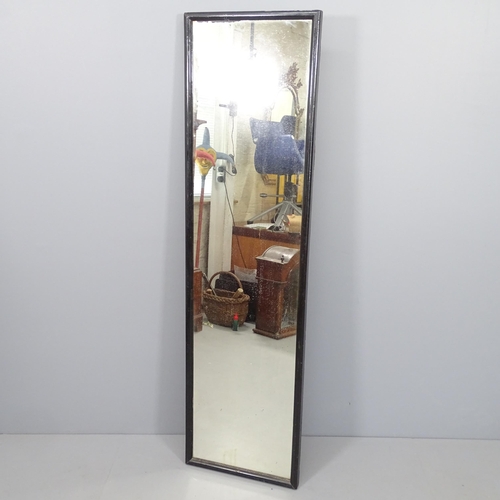 2286 - An Antique rectangular wall mirror with ebonised frame. 46x167cm.