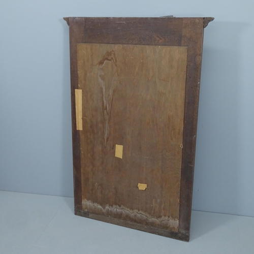 2288 - A French oak wall mirror, with applied carved decoration. 88x130cm