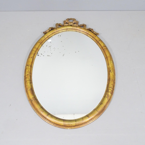 2291 - A painted continental style oval wall mirror. 71x108cm.