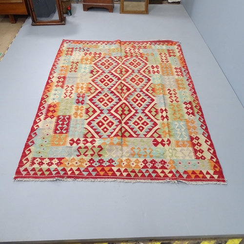 2304 - A Chobi Kilim rug. 198x150cm.