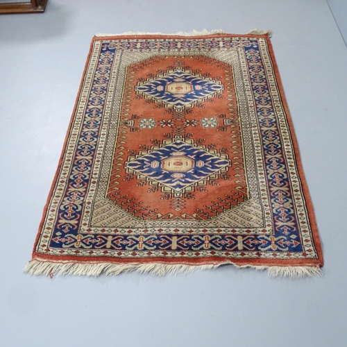 2307 - An Afghan design rug. 155x102cm.