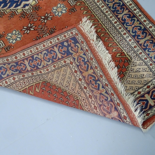 2307 - An Afghan design rug. 155x102cm.