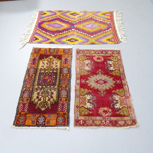 2309 - A Kilim mat, 102x72cm, and two Persian mats, 87x48cm (3)