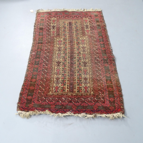 2311 - A red-ground Persian prayer rug. 150x90cm.