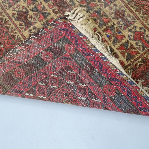 2311 - A red-ground Persian prayer rug. 150x90cm.