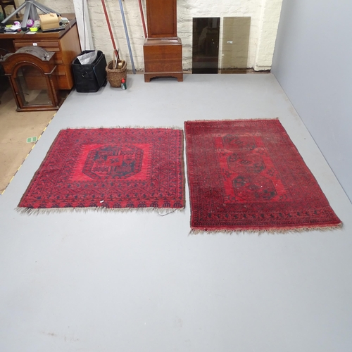 2332 - Two small red-ground Bokhara rugs. Largest 140x94cm. Square 110x110cm.