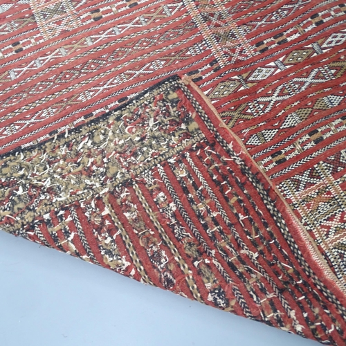 2334 - An African Tuareg carpet. 228x145cm.