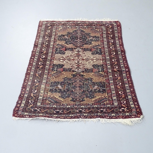 2343 - A blue-ground Persian shiraz rug. 118x90cm.