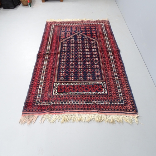 2345 - A red-ground Persian prayer rug. 186x112cm.