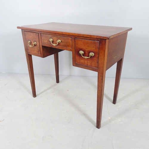 2697 - An early 20th century crossbanded mahogany lady's writing desk, with three drawers and raised on squ... 