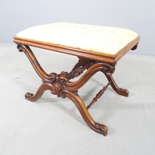 2698 - An antique continental rosewood and mahogany footstool, with x-frame base and carved decoration. 54x... 