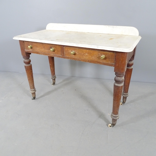 2701 - A Victorian mahogany marble topped wash stand. with two frieze drawers and raised on turned legs. 10... 