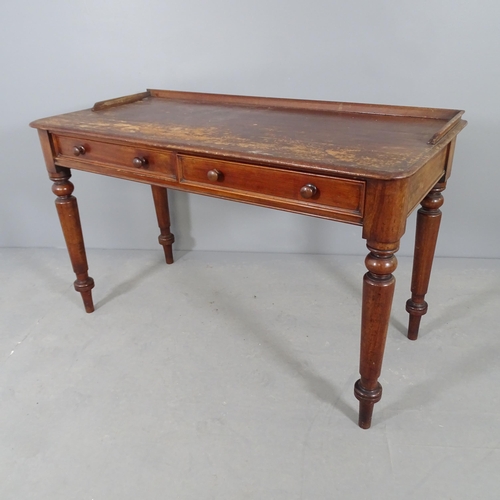 2702 - A Victorian mahogany wash stand, with two frieze drawers and turned legs. 122x77x55cm