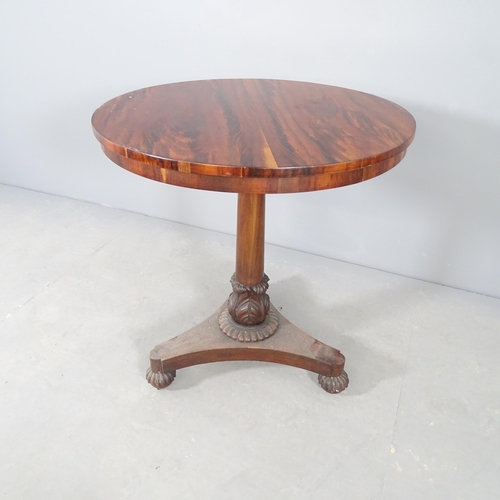 2726 - An antique rosewood circular top occasional table on central column with platform base and carved de... 