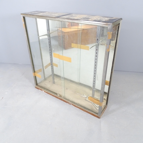 2734 - A glazed shop display cabinet. 96x96x23cm.