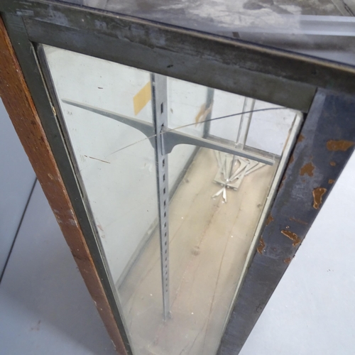 2734 - A glazed shop display cabinet. 96x96x23cm.